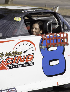 Clarity Newhouse drives her race car