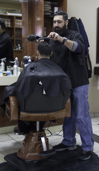 Muayad Shakir styling hair