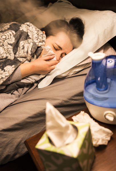sneezing woman