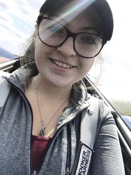The author takes a selfie in the cockpit of her training glider.