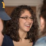 Aliahna Porter (Antigone) and her castmates share a smile during warm-ups