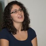 Aliahna Porter (Antigone) warms up with some vocal exercizes before rehearsal