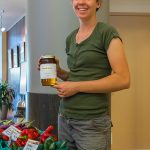 Anthea van Geloven displays honey and fresh produce from Green Things Farm