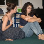 Laura Lilly Cotten (Ismene) and Aliahna Porter (Antigone) perform a serious scene