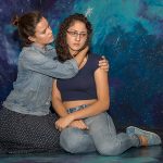 Laura Lilly Cotten (Ismene) and Aliahna Porter (Antigone) rehearse a serious scene