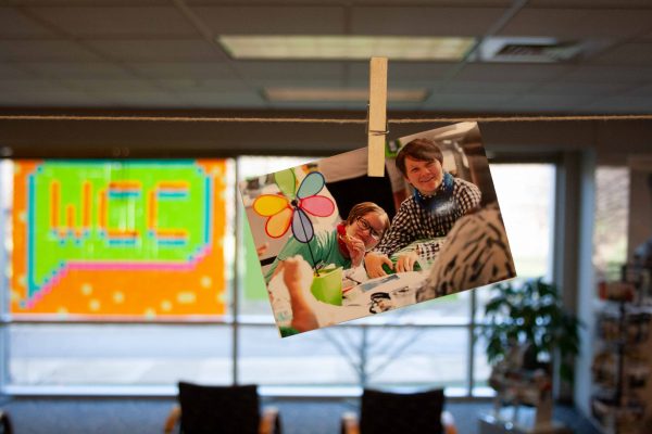 The Bailey Library is hosting a special event featuring the Humans of Washtenaw County project. Here, the exhibition is being assembled in preparation. Vardan Sargsyan | Washtenaw Voice