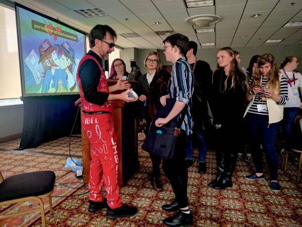 Michael Kortezky talks with students after the session. Vardan Sargsyan | Washtenaw Voice