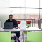 Mario Gibbons, a criminal justice major, studies in the Quiet Study space, which provides students with an area to study and eat while having accessible charging stations. Josh Mehay | Washtenaw Voice