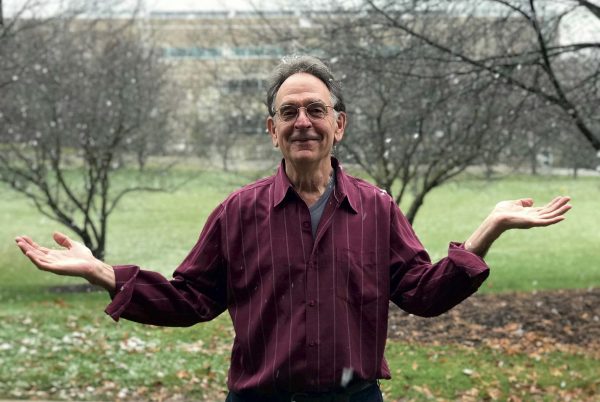 Three-time published English professor, Jas Obrecht, outside of his music journalism classroom. Abby Eckert | Contributor