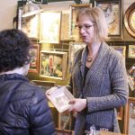 Teresa Petersen displays some of her artwork, much of which focuses on a theme of women’s roles in society throughout history. Find her at teresapetersen.com. Vardan Sargsyan | Washtenaw Voice