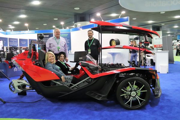 Cindy Millns, professional faculty of CIS and cybersecurity at WCC, and Susan Ferraro, director of media relations at WCC, test the seats of the Polaris Slingshot, which was modified for Level 2 self-driving capability. Joshua Mehay | Washtenaw Voice