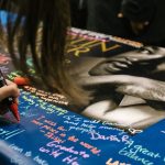 Students, staff and faculty shared their dreams inspired by Martin Luther King, Jr. on a banner. Sara Faraj | Washtenaw Voice
