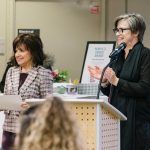 President of WCC, Dr. Rose B. Bellanca (left) passes out award certificates to Student Art Show winners with Jill Jepsen, a WCC faculty member. Sara Faraj | Washtenaw Voice