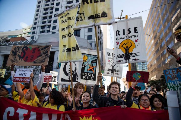 Hundreds of protesters push their way towards San Francisco's Moscone Center, which was host to the Global Climate Action Summit in 2018. Courtesy of Gina Ferazzi | Los Angeles Times