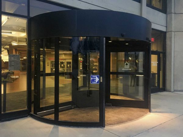 Revolving doors help to prevent air from leaking out of a building when people enter and exit. Lilly Kujawski | Washtenaw Voice