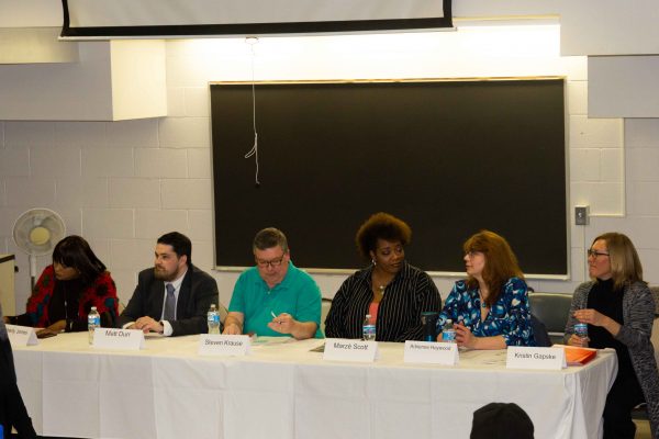 Panelists for the “Cool Careers in Writing” event hosted by the English department at Washtenaw Community College prepare to share the key to becoming a successful writer. Adeline Griffith | Washtenaw Voice