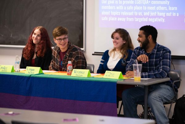 From left, panelists Emilee Seghi, Logan Gyolai, Veronica Zeimet and Nate Duncan share their experiences as LGBTQIA+ identifying individuals at WCC. Lily Merritt | Washtenaw Voice