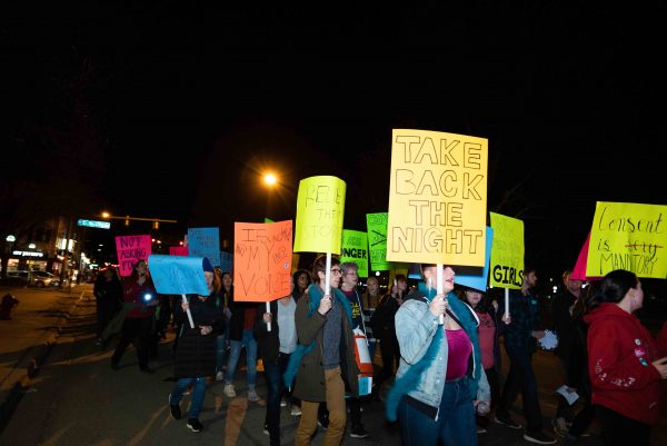 Building on 41 years of activism, “Take Back the Night” participants take to the streets as they march through downtown Ann Arbor. Lily Merritt | Washtenaw Voice