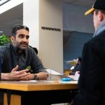 Al Alsaidy shares with a student what it was like to emigrate to the Unites States and why his family took the risk. Lily Merritt | Washtenaw Voice