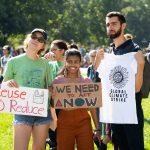 Strikers attend the Climate Strike to participate in the conversation and raise awareness about climate change. Eric Lee | Washtenaw Voice