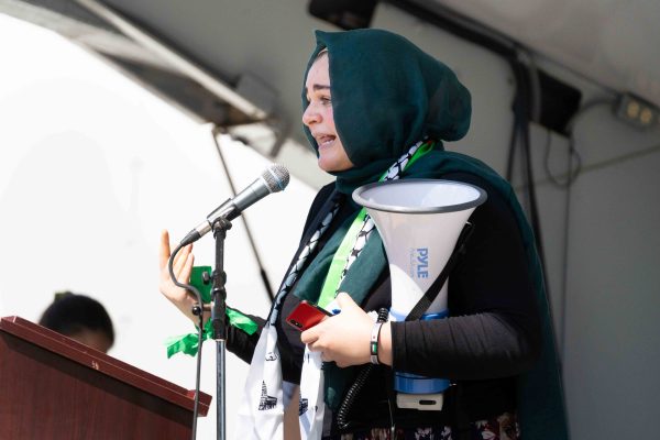 Zaynab Elkolaly, a WCC student, speaks at the climate strike to participate in the conversation and raise awareness about climate change. Eric Lee | Washtenaw Voice