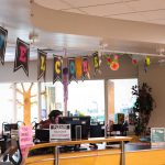 The front desk at Richard W. Bailey Library welcomes new students back for the year. Lily Merritt | Washtenaw Voice