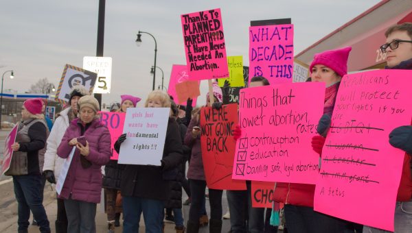 Protestors defend Planned Parenthood and healthcare access in a February, 2017 rally in front of the Planned Parenthood on W. Stadium Blvd. in Ann Arbor. VOICE FILE PHOTO