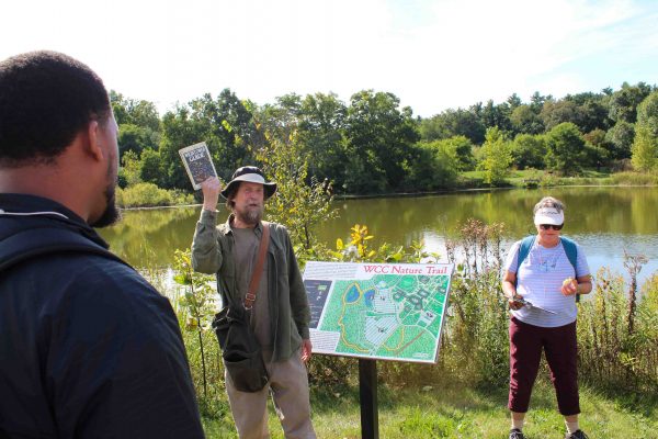 Greg Vaccavek, a native species expert, led an educational nature walk through the WCC nature area for students. He focused on pollinator-attracting plants native to Michigan. Lilly Kujawski | Washtenaw Voice