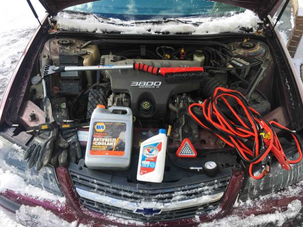 Gloves, antifreeze, a snow/ice remover, hazard lights, pressure guages and jumper cables are some items to help prepare for winter driving. Brian Babcock | Washtenaw Voice