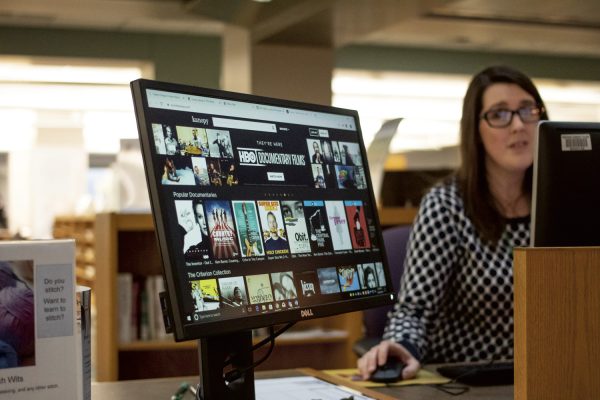 Bailey Library librarian Meghan Rose demonstrates how the Kanopy streaming service works. Varden Sargsyan | Washtenaw Voice