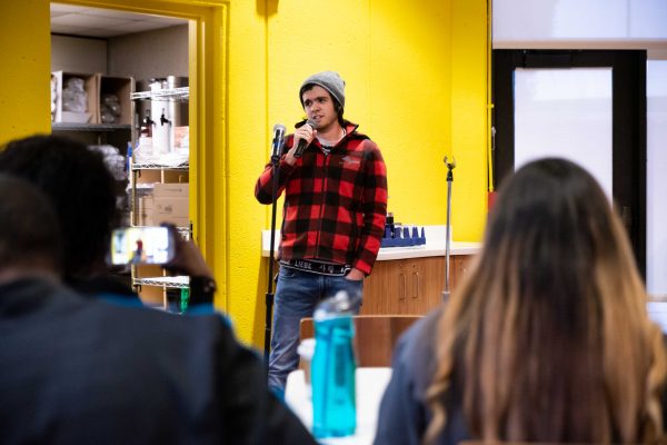 Zachary Panicacci performing “Turn the Lights Down Low” by Josh Turner. Lily Merritt | Washtenaw Voice