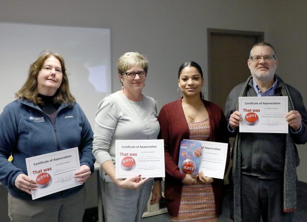 Several WCC staff members were presented with "That Was Easy" awards on behalf of the Business Department for making life and the mechanics of teaching at WCC a little bit easier. The recipients are, from left: Nancy Collison, Innovation Technologies Manager/CiTL; Joy Garrett, Director of Curriculum & Assessment; Cieara Franklin, Campus Safety Technician; and Roger Mourad, Director of Institutional Research. Not pictured: Megan Keefer, Human Resource Generalist. Courtesy of Kelly Gampel