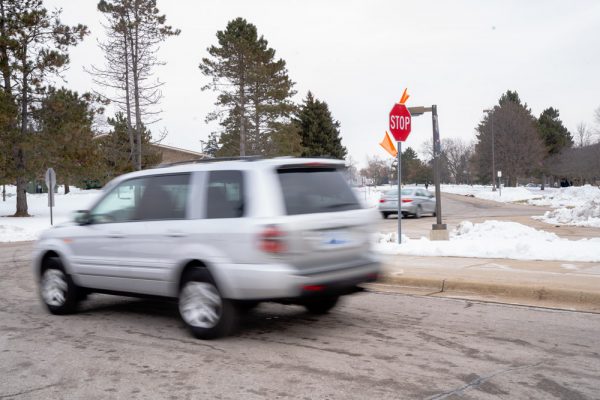 The college recently installed four new stop signs at intersections around campus after reports of confusion and safety concerns. Torrence Williams | Washtenaw Voice