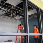 Crew members work on a construction project on the second floor of the TI building. Lilly Kujawski | Washtenaw Voice