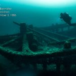 Diver Michael Moulton is shown at the wreck of the M. Stalker in Lake Huron. This is one of the Jeremy Bannister photographs included in "Disasters of the Deep: Underwater Photography of Great Lakes Shipwrecks" at the National Museum of the Great Lakes. [CONTRIBUTED PHOTO]