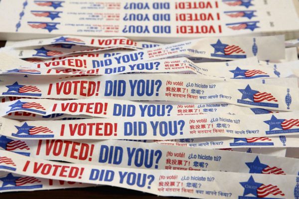 Voting tags at St. Augustine College are on display as Chicago voters hit the polls on April 2, 2019.
