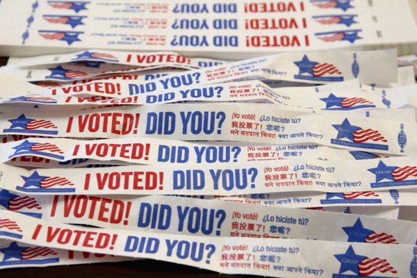 Voting tags at St. Augustine College are on display as Chicago voters hit the polls on April 2, 2019.