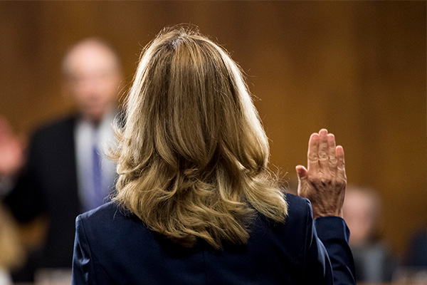 Christine Blasey Ford being sworn in before the Senate Judiciary Committee. Tribune Media