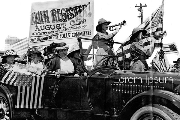 The 19th Amendment, giving women the right to vote, passed in 1920, and in August of that year, a Chicago suffrage group paraded through Chicago urging women to register to vote in their first election. League of Women Voters members are Mrs. J.N. McGraw, from left, Mrs. G.N. Payson, Mrs. Charles S. Eaton, Mrs. E.F. Bemis, Mrs. A.N. Schweizer, Mrs. Ida Strawn Randall, trumpeter Helen Hamilton and Billie Frees. VOICE FILE PHOTO