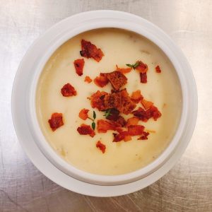 Fish chowder with a crispy bacon garnish. Samantha Evens | Washtenaw Voice