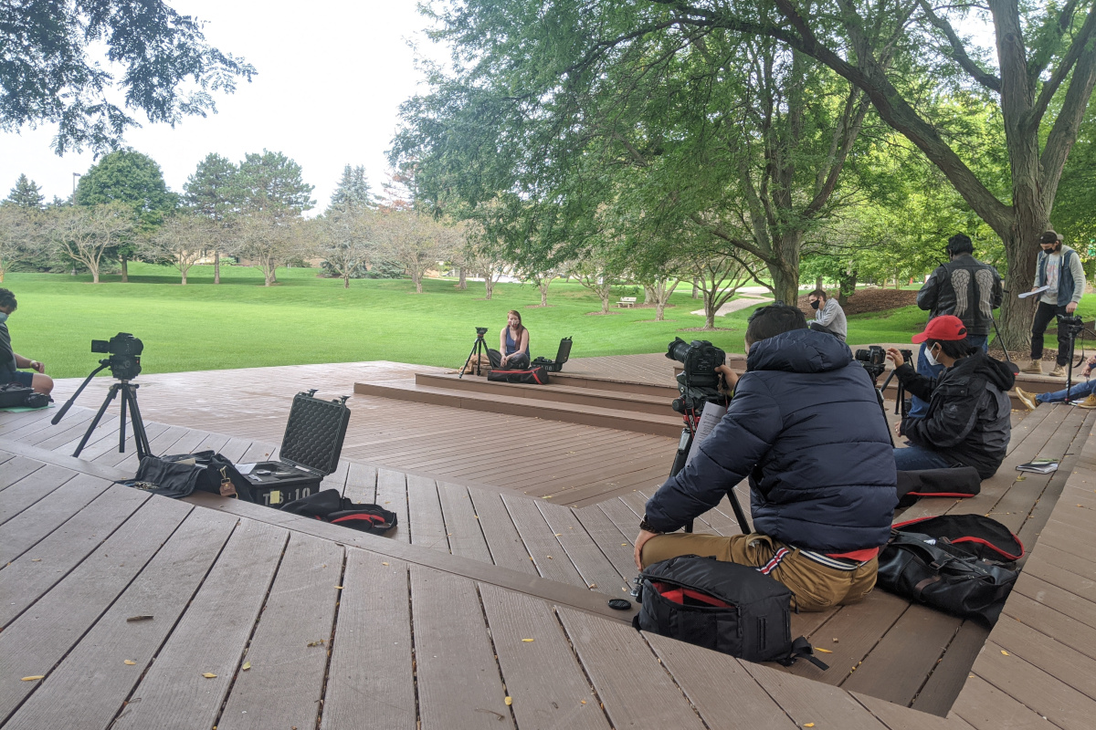Students attend class outdoors while social distancing and wearing masks. Cydney Heed | Washtenaw Voice