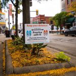 Signs in Downtown Ann Arbor depict COVID-19 restrictions and the present normal. Torrence Williams | Washtenaw Voice