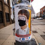 Signs in Downtown Ann Arbor depict COVID-19 restrictions and the present normal. Torrence Williams | Washtenaw Voice