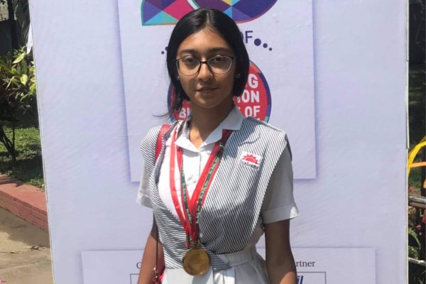 Shaheed receives her high school merit award in Bangladesh. Photo: Saiyara Shaheed