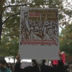 A sign at the Women's March about nonviolent protest. Weevern Gong | Washtenaw Voice