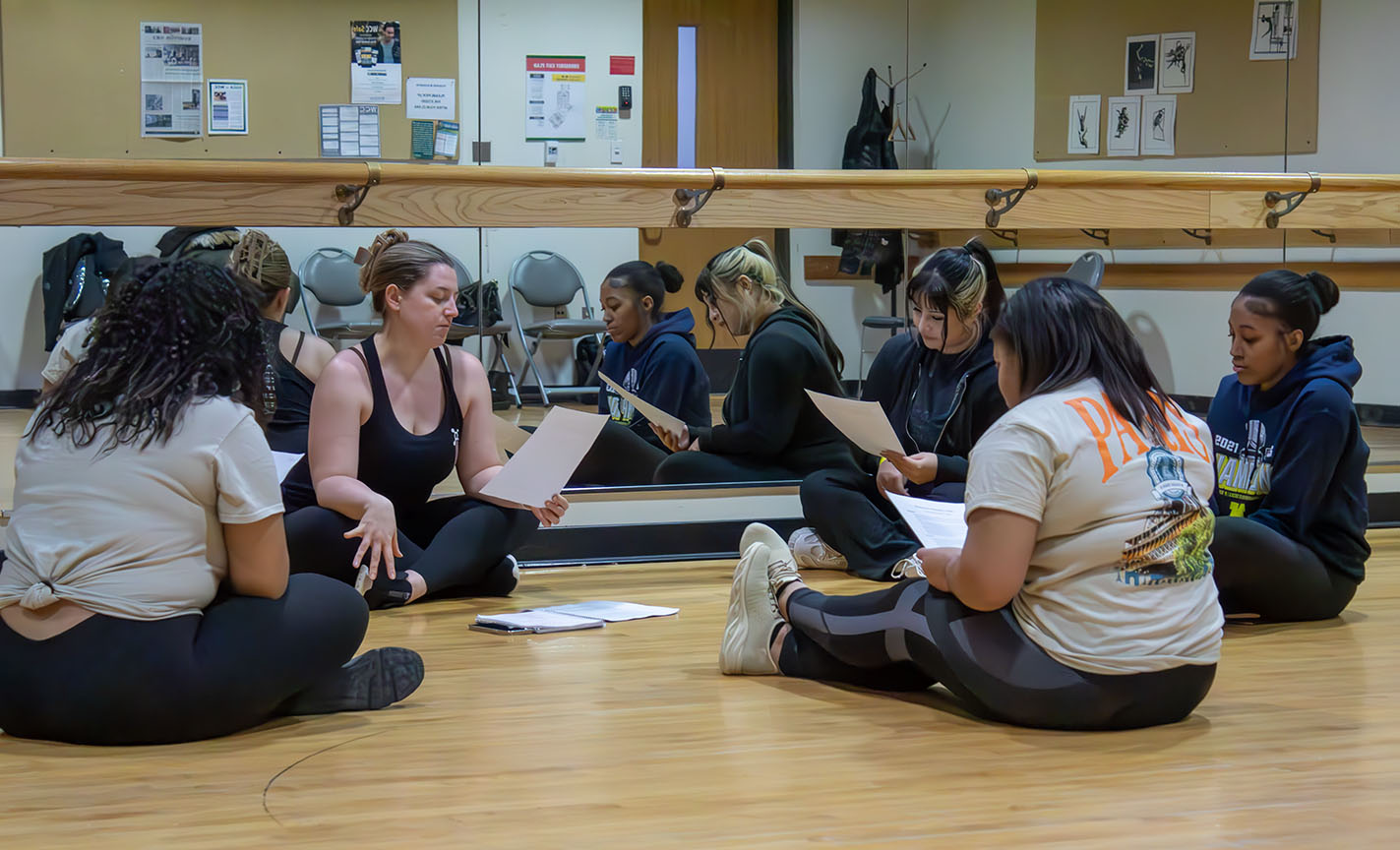 dance-tryout-members-discuss-what-they-will-be-practicing-on-tuesday