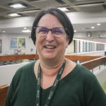 headshot of Laurie Englehart from the shoulders up smiling