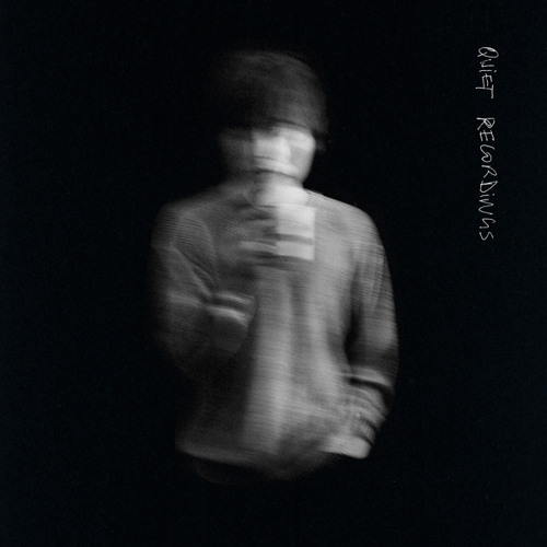 The cover of the Matt Maltese EP, "Quiet Recordings." It features a blurry black and white image of Maltese holding something.