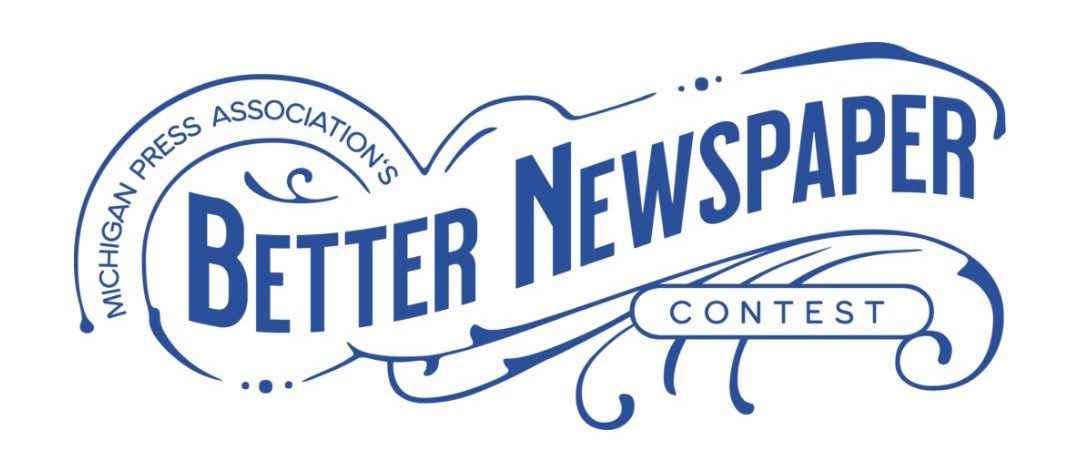 A blue logo with the text "Michigan Press Association Better Newspaper Contest."